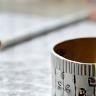 Measuring tape and furniture plans